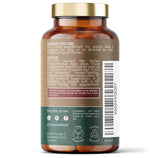 Brun beholder med 90 veganske kapsler, etikett med detaljer om bruk og ingredienser. Kapslene er synlige inni.