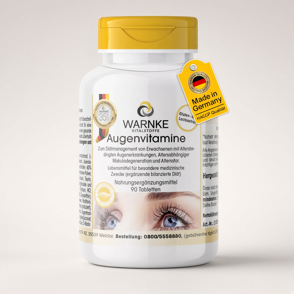 Øyevitaminer fra Warnke, hvit flaske med gult lokk, inneholder 90 tabletter. Etiketten beskriver innhold og bruksanvisning.