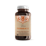Vegetarisk kapselflaske med 180 kapsler. Etikett med navnet "Premium TURMERIC", kremfarget bakgrunn med oransje detaljer.
