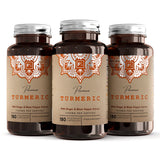 Tre brune flasker med vegetabilske kapsler, etikett med teksten "Premium Turmeric" og oransje detaljering.