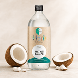 1000 ml flaske med Go-Keto MCT Olje Pure C8, klar væske ved siden av halvdeler av kokosnøtt. Vegansk, nøytral smak.