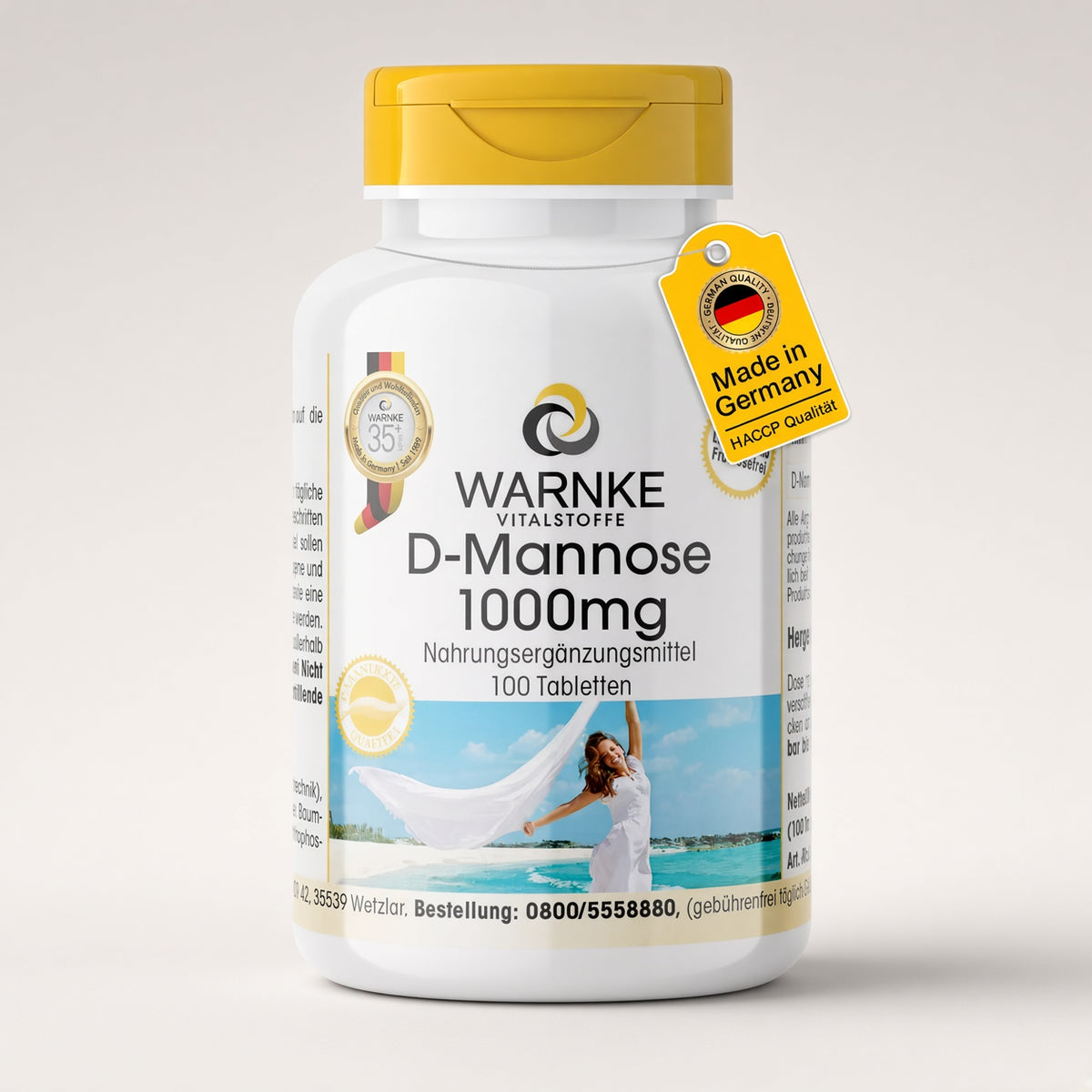 D-Mannose 1000 mg, 100 veganske tabletter i en hvit beholder med gult lokk og merke fra Warnke Vitalstoffe.