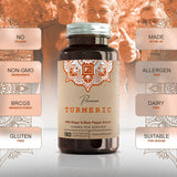 Kapselbeholder med "Premium Turmeric" i brune og oransje farger, innhold av ingefær og sort pepper, 180 vegetarkapsler.