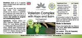 Baldrian Complex med humle og sitronmelisse, 60 veganske kapsler. Grønn etikett med urter og kapsler illustrert.