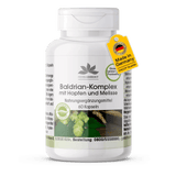 Baldrian Kompleks med humle og sitronmelisse, hvit plastbeholder med 60 veganske kapsler og grønt design.